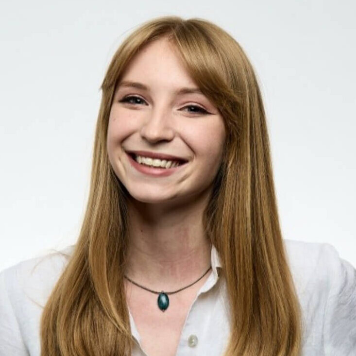 a woman smiling at camera